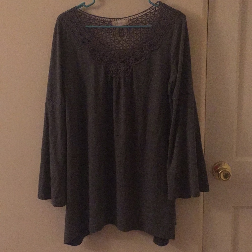 Flowy embroidered top with bell sleeves